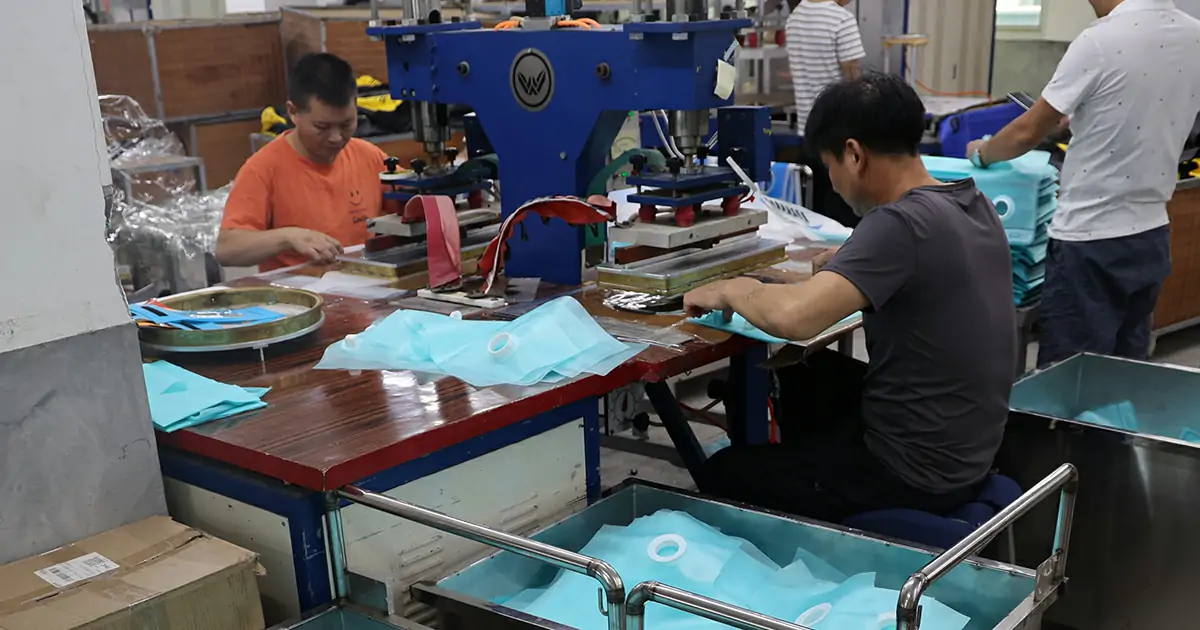 A Worker is manufacturing soft flasks using TPU material